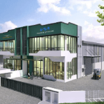 Unit kilang Berkembar moden di Hab Perindustrian Ideal, menampilkan siling tinggi, ruang pengeluaran yang luas dan fasad kaca kontemporari.